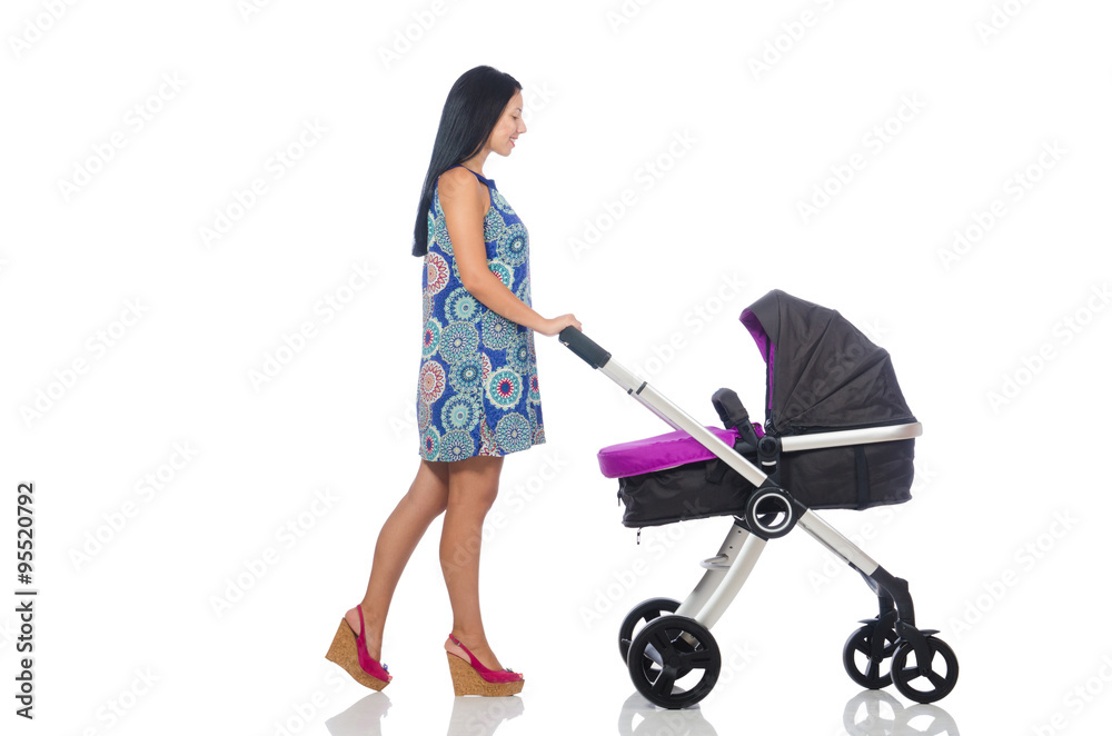 Happy mom with her baby in pram 