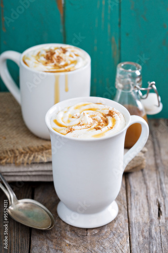 Hot caramel drink with whipped cream