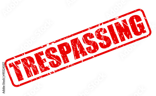 TRESPASSING red stamp text