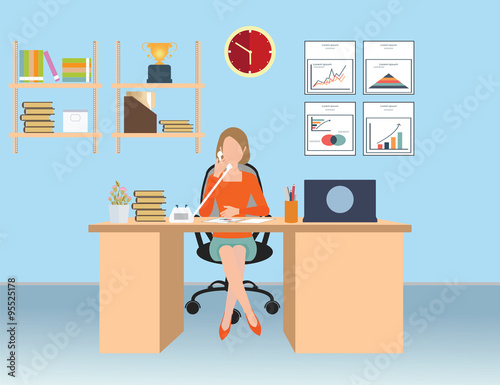 Businesswoman talking on the phone in office.