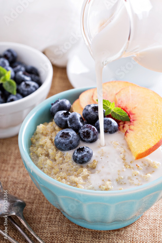 Breakfast quinoa porridge with fresh fruits
