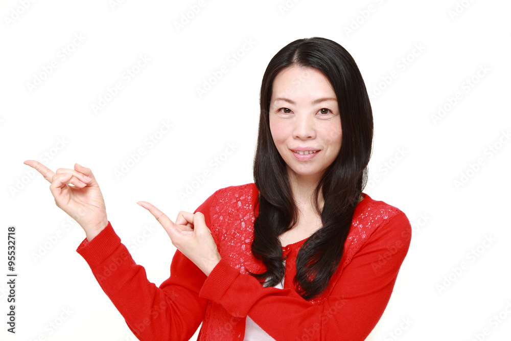 Japanese woman presenting and showing something Japanese woman presenting and showing something