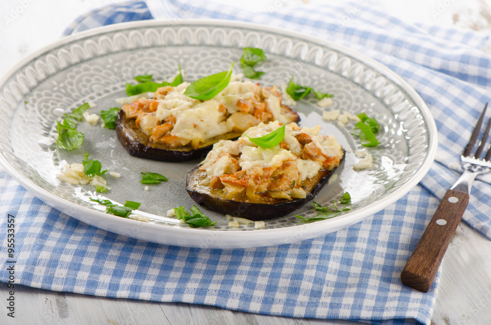 Baked eggplant with chanterelles, cheese and fresh herbs. Baked eggplant with chanterelles, cheese and fresh herbs.