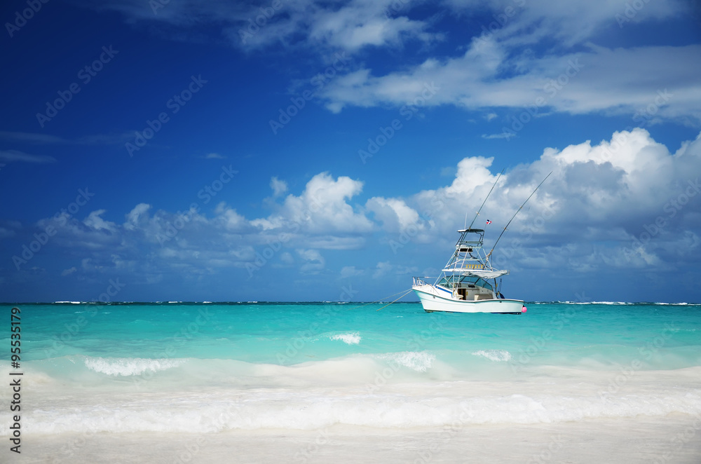 Sailing yacht near beautiful tropical beach Sailing yacht near beautiful tropical beach