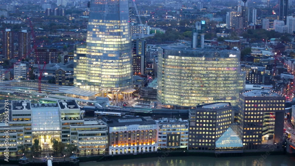 LONDON, UK - NOVEMBER 4, 2015: Night view of City of London. view from the 35 floor includes London bridge and lots of traffic LONDON, UK - NOVEMBER 4, 2015: Night view of City of London. view from the 35 floor includes London bridge and lots of traffic
