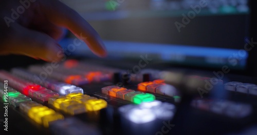 Hand Pulling The T-Bar On A Video Switcher