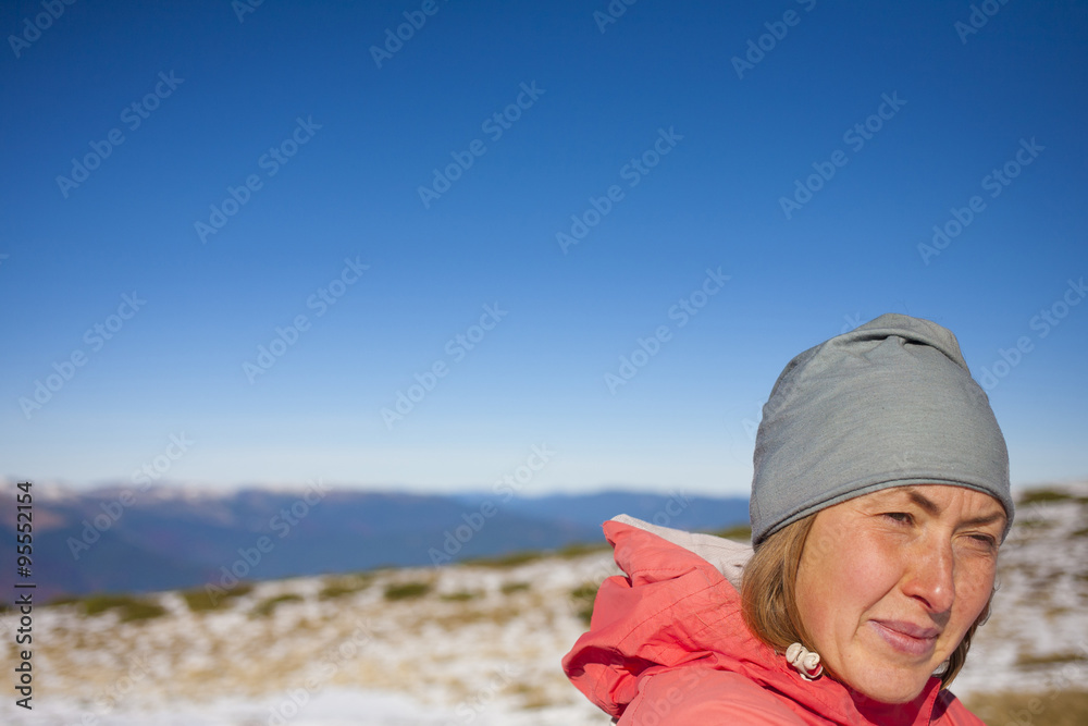 Girl resting in the mountains.