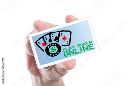Hand holding play poker online card with four aces