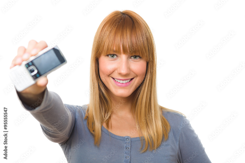 Portrait of a young woman holding out a cell phone. Isolated on white Portrait of a young woman holding out a cell phone. Isolated on white