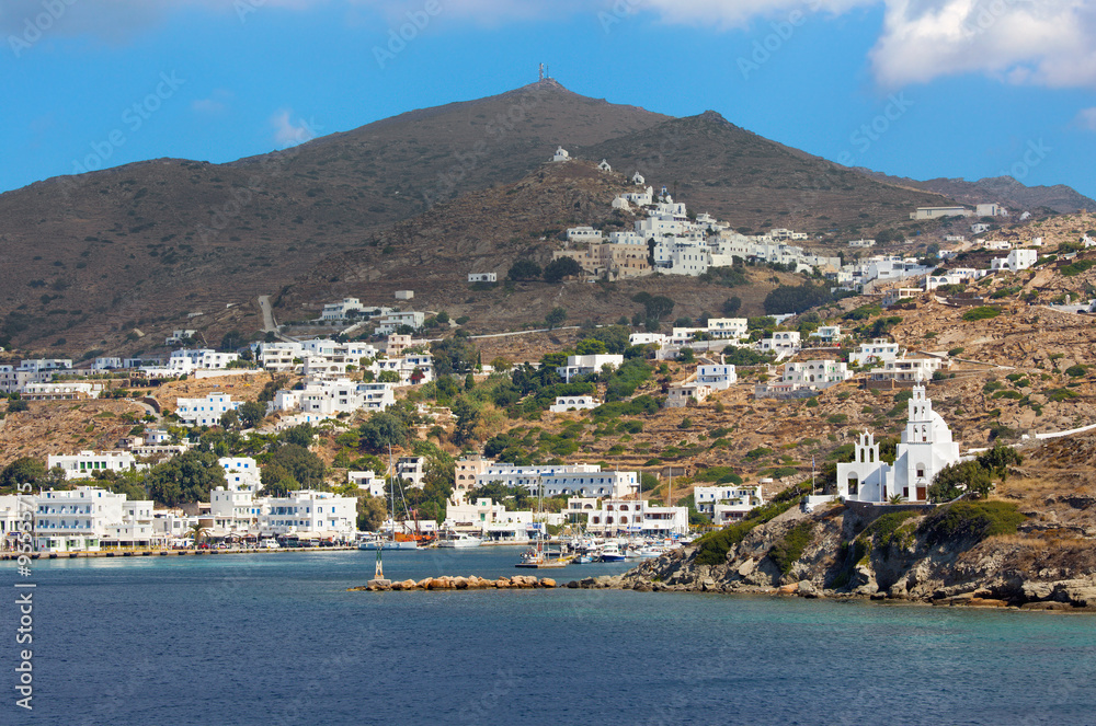 Chora - The church Agia Irini on the right side and Chora town on the Ios island in the Aegean Sea (Greece).