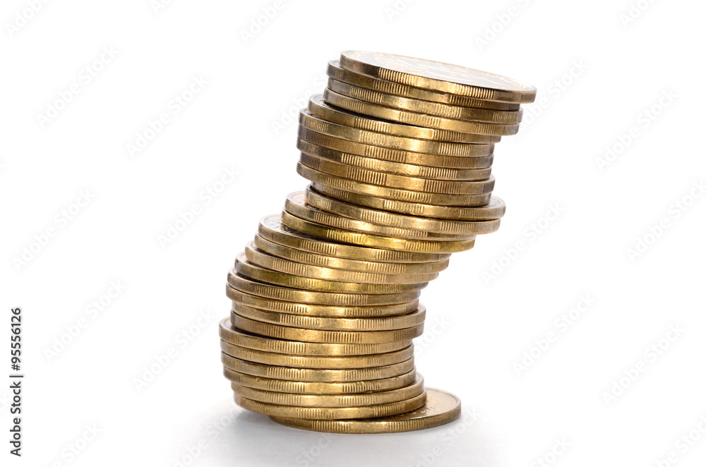 Coins from yellow metal isolated on a white background Coins from yellow metal isolated on a white background