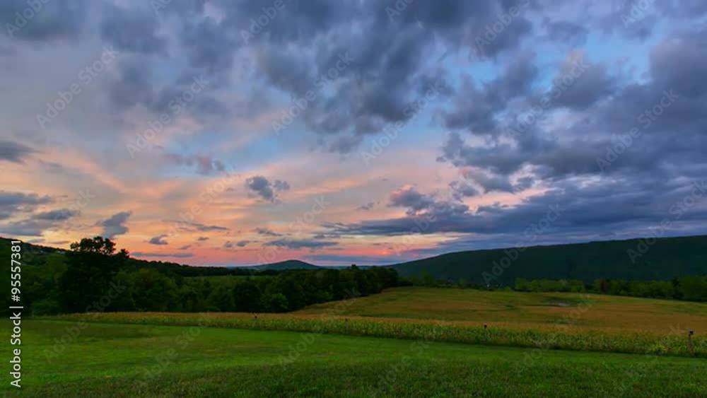 Day to Night Field Time Lapse. a dramatic time lapse of a beautiful landscape. dramatic sunset clouds
Day to Night Field Time Lapse. a dramatic time lapse of a beautiful landscape. dramatic sunset clouds