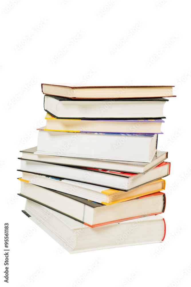 Pile of books with different colors of covers and white background Pile of books with different colors of covers and white background