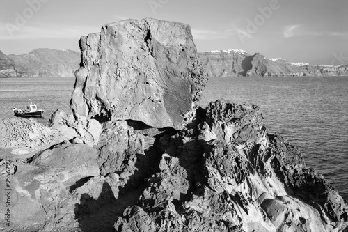 Santorini -  caldera across the pumice boulders with the Scaros and Imerovigili photo