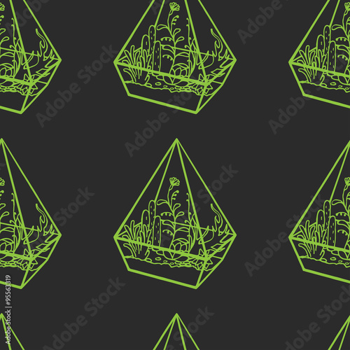 glass polygonal terrarium  with succulent plants, grass and flowers