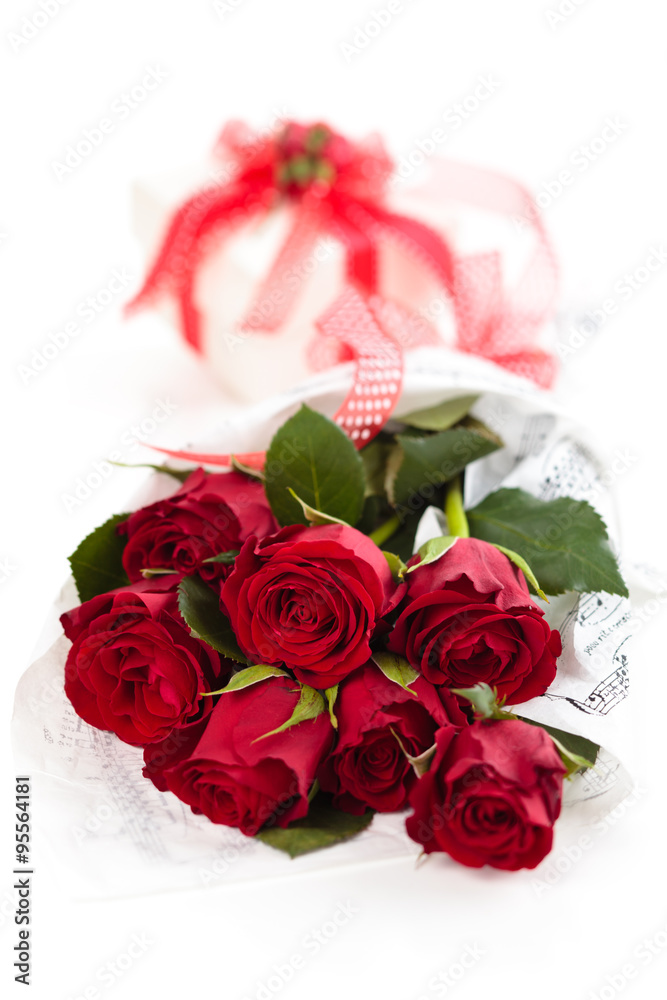 Red roses and gift. Red roses and gift.