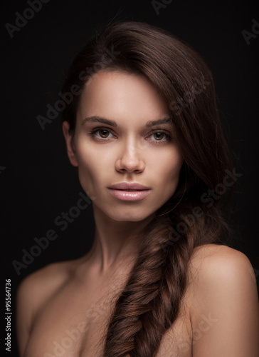 beautiful young brunette woman with long hair 