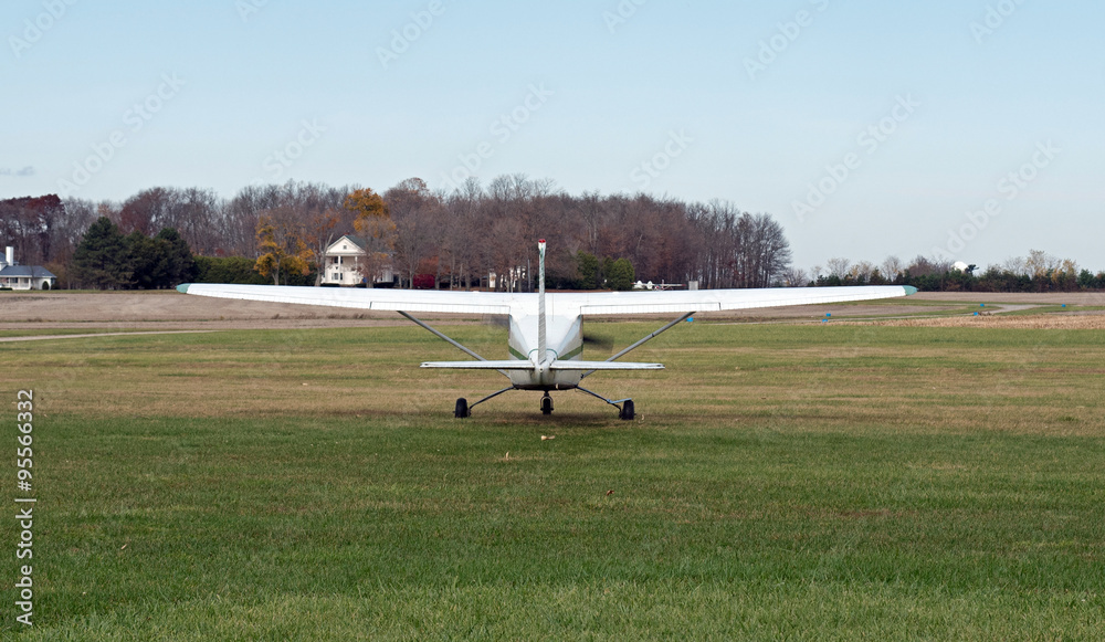 Tail of Single Engine Prop Plane about to Take Off Tail of Single Engine Prop Plane about to Take Off