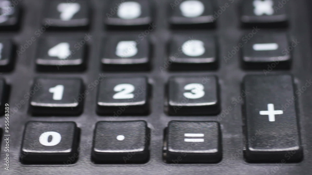 Panning over a cropped calculator displaying the keys and numbers Panning over a cropped calculator displaying the keys and numbers