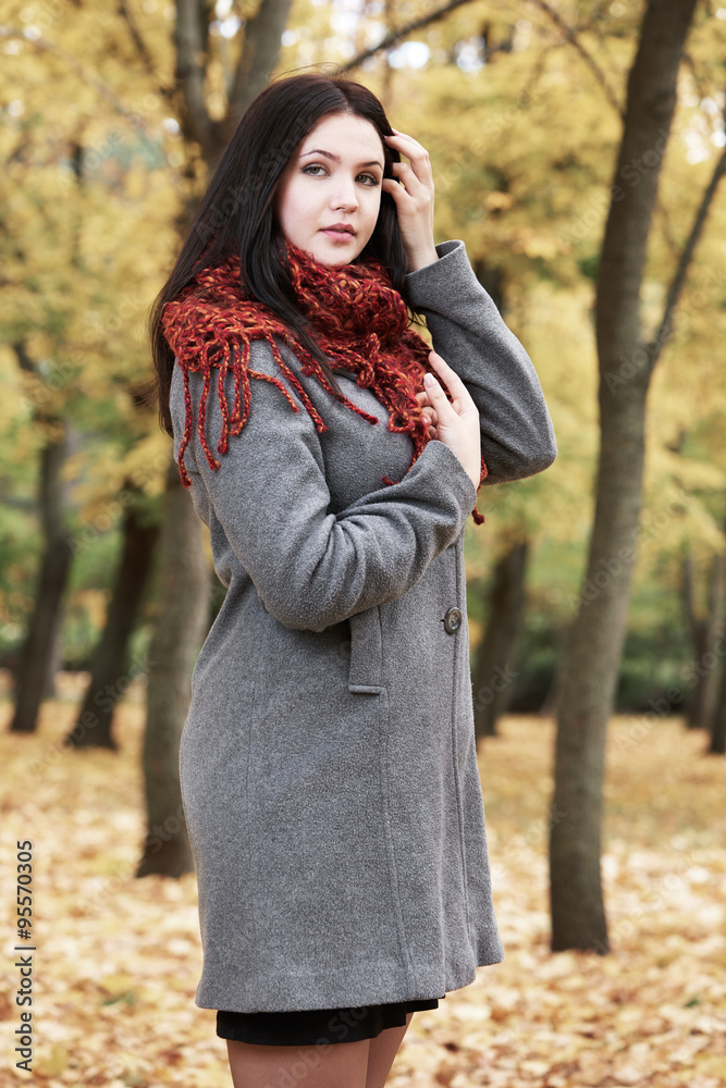 girl portrait with red scarf in autumn city park, fall season girl portrait with red scarf in autumn city park, fall season