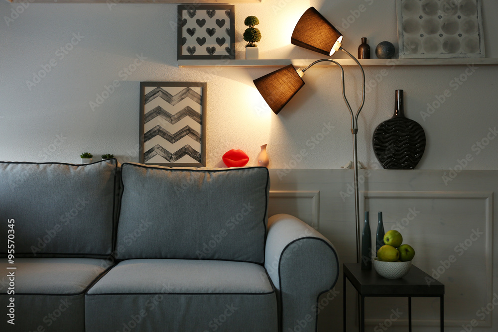 Beautiful modern living room with grey sofa and floor lamp Stock Photo ...