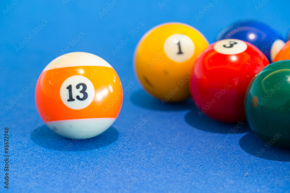 orange snooker ball with number thirteen on it with other colorf orange snooker ball with number thirteen on it with other colorf