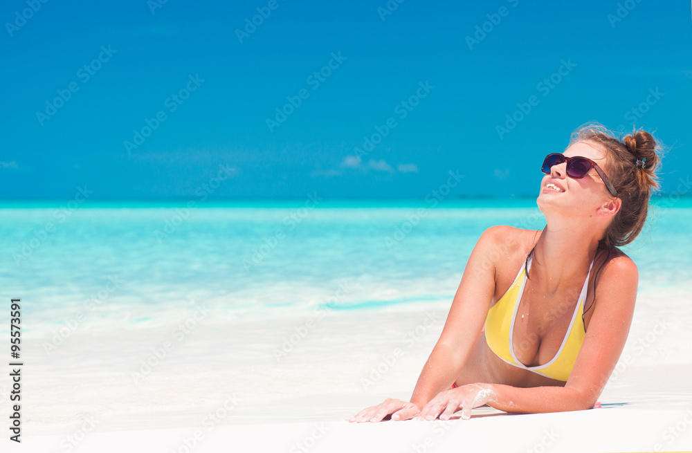 long haired girl in having fun on tropical barbados beach 
