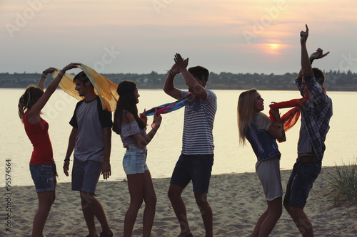 Happy friends having fun on...