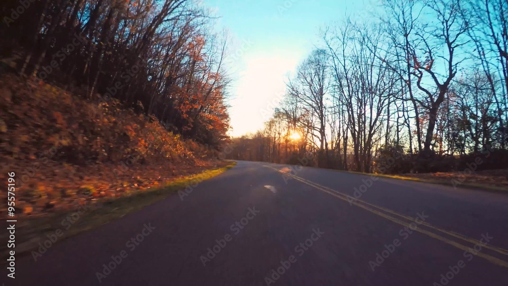 Autumn driving shot of the Blue Ridge Parkway through North Carolina at sunset Autumn driving shot of the Blue Ridge Parkway through North Carolina at sunset