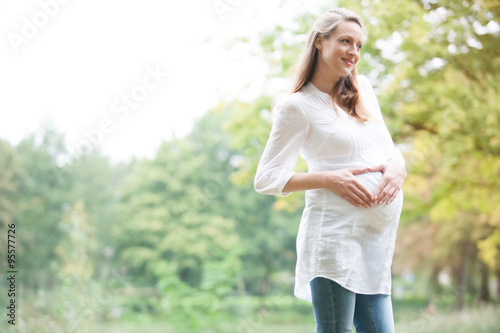 Expecting woman in nature