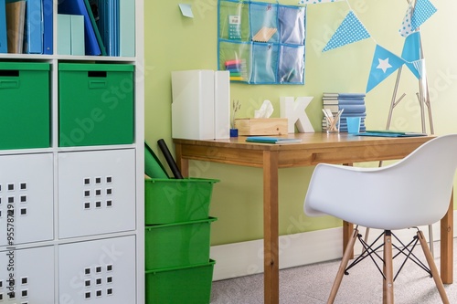 Schoolboy's desk in modern room