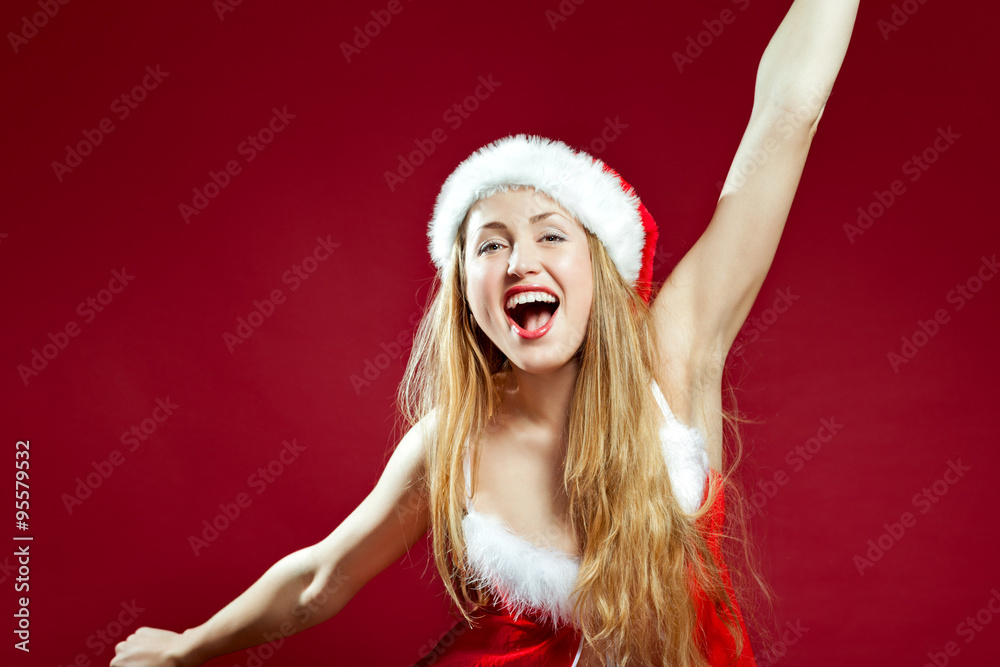 Sexy santa helper on red background Sexy santa helper on red background