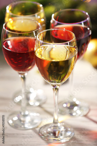 Wine and Christmas decoration on wooden table