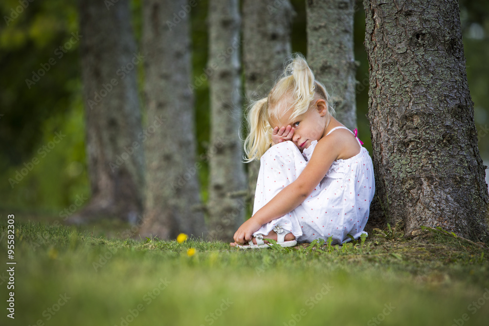shy little girl in the park shy little girl in the park