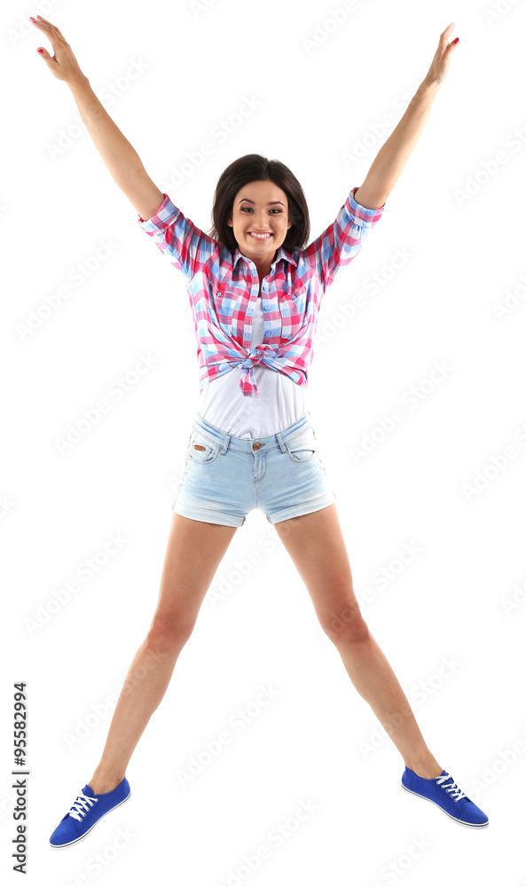 Active girl jumping in joy, isolated on white Active girl jumping in joy, isolated on white