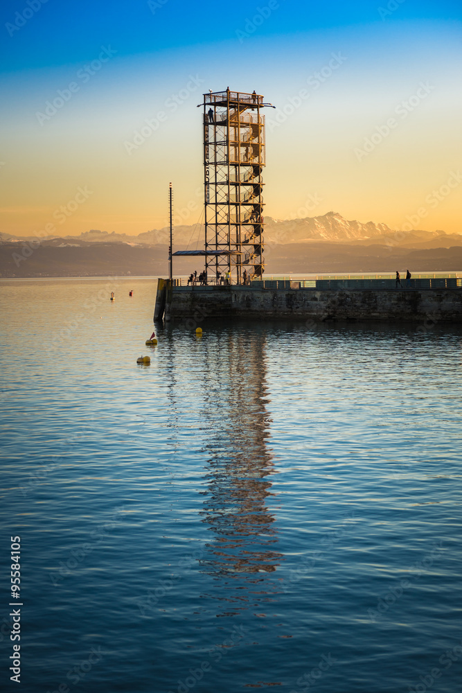 Pier with Sightseeing Tower situated at the Harbor in Friedrichshafen - lake constance. High Dynamic Range Picture.