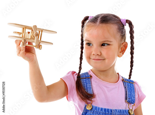 Beautiful little girl plays...