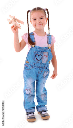 Beautiful little girl plays...