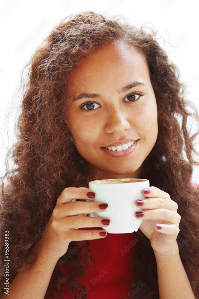 Close up portrait of young pretty woman drinking coffee Close up portrait of young pretty woman drinking coffee