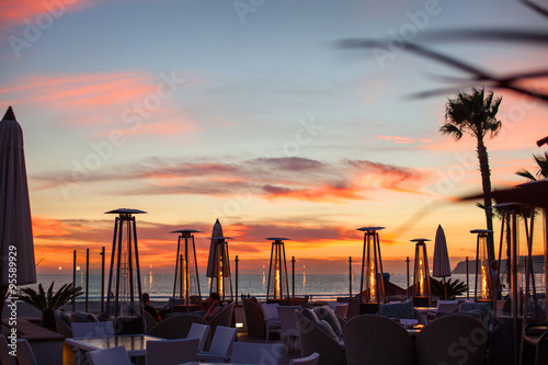 Beautiful Sunset at the Beach Cafe with Outdoor Patio Heaters in