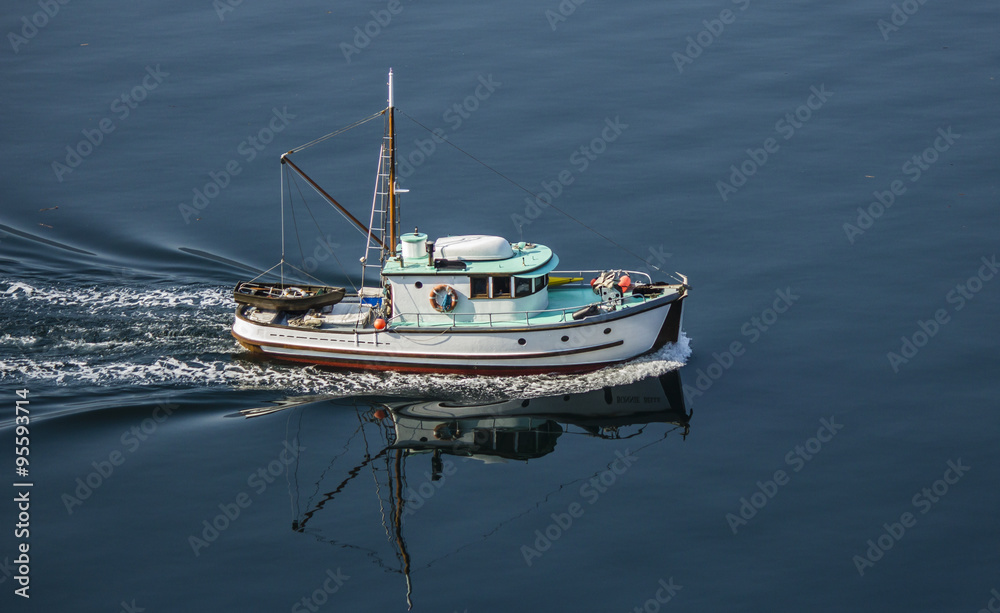 Old Fishing Boat in Ocean Stock Photo