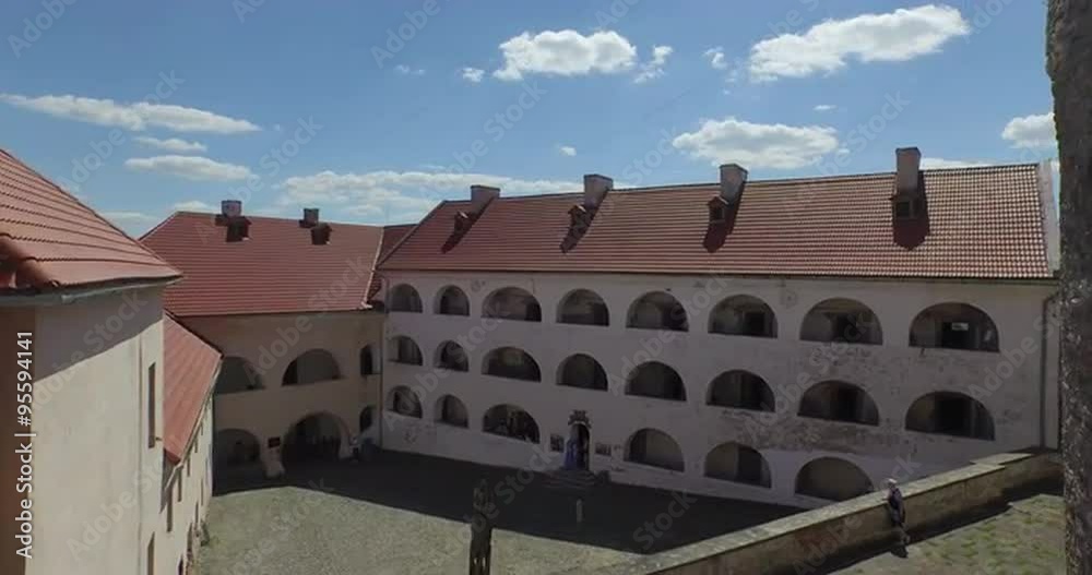 The Palanok Castle in Mukachevo,Ukraine. Yearly over 100 000 travelers from all over the world come here in order to see this unique sample of fortification architecture The Palanok Castle in Mukachevo,Ukraine. Yearly over 100 000 travelers from all over the world come here in order to see this unique sample of fortification architecture