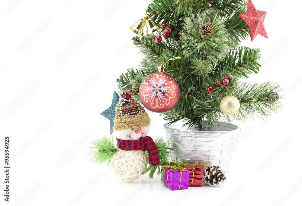 closeup and cropped image of christmas tree with santa claus , gift box, red ball,pinecone and golden ball isolated on white background closeup and cropped image of christmas tree with santa claus , gift box, red ball,pinecone and golden ball isolated on white background