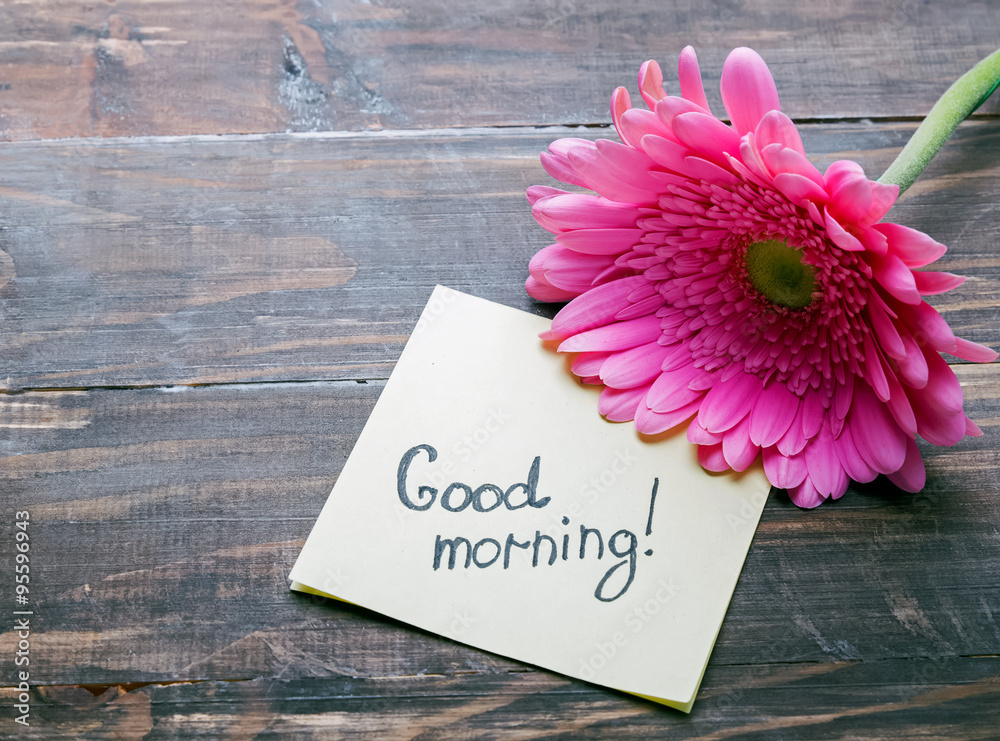 Gerbera flower and paper with text "good morning" - obrazy, fototapety, plakaty 