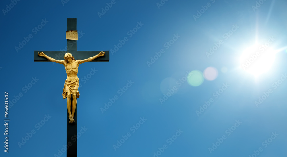 Jesus Christ on the cross over blue sky background Stock Photo | Adobe ...