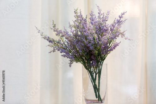 Fototapeta Naklejka Na Ścianę i Meble -  Bouquet of purple plastic flower