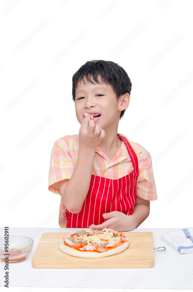 Little Asian chef eating crab between cooking pizza Little Asian chef eating crab between cooking pizza