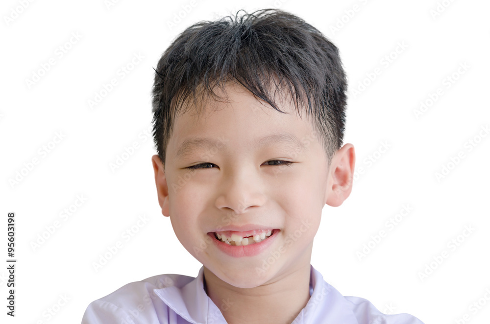Happy Asian boy toothless smile close-up,new teeth rising over w Happy Asian boy toothless smile close-up,new teeth rising over w