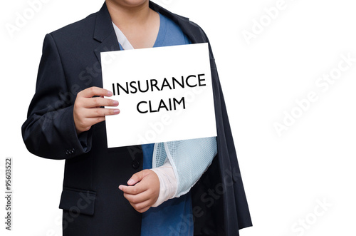 businessman with broken hand and card with text "insurance claim