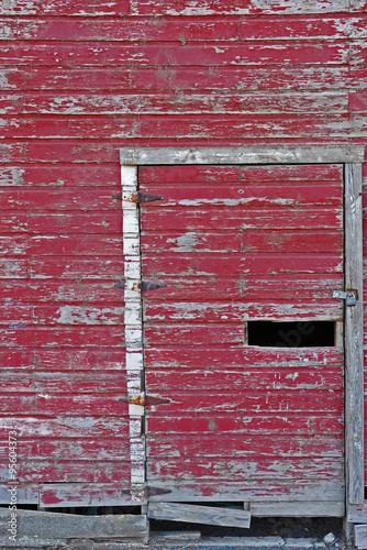 barn door on side of old red barn
